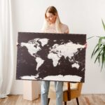 world map with pins to mark travels 7p