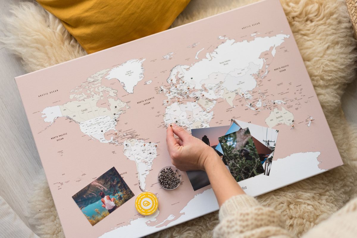 small canvas world map with pins to track countries visited