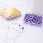 small purple map push pin for marking corboard tripmap