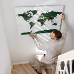 world map for marking travels with pins forest green 33p