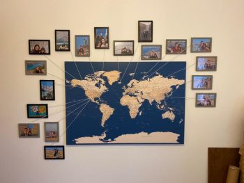 blue-world-map-with-pins-and-string