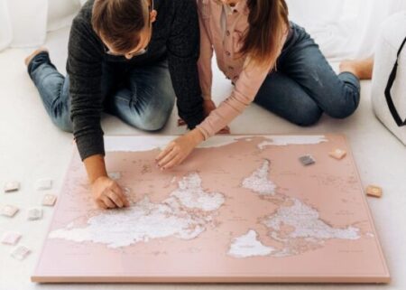 pink-travel-world-map-with-pins-aspect-ratio-543-387